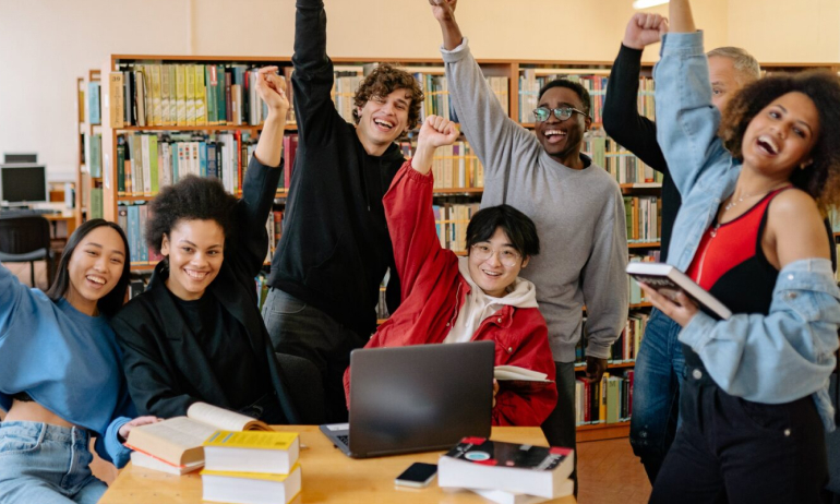 students raising their hands