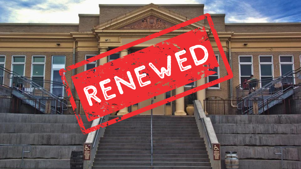 School building with large stamp proclaiming renewed on top of it