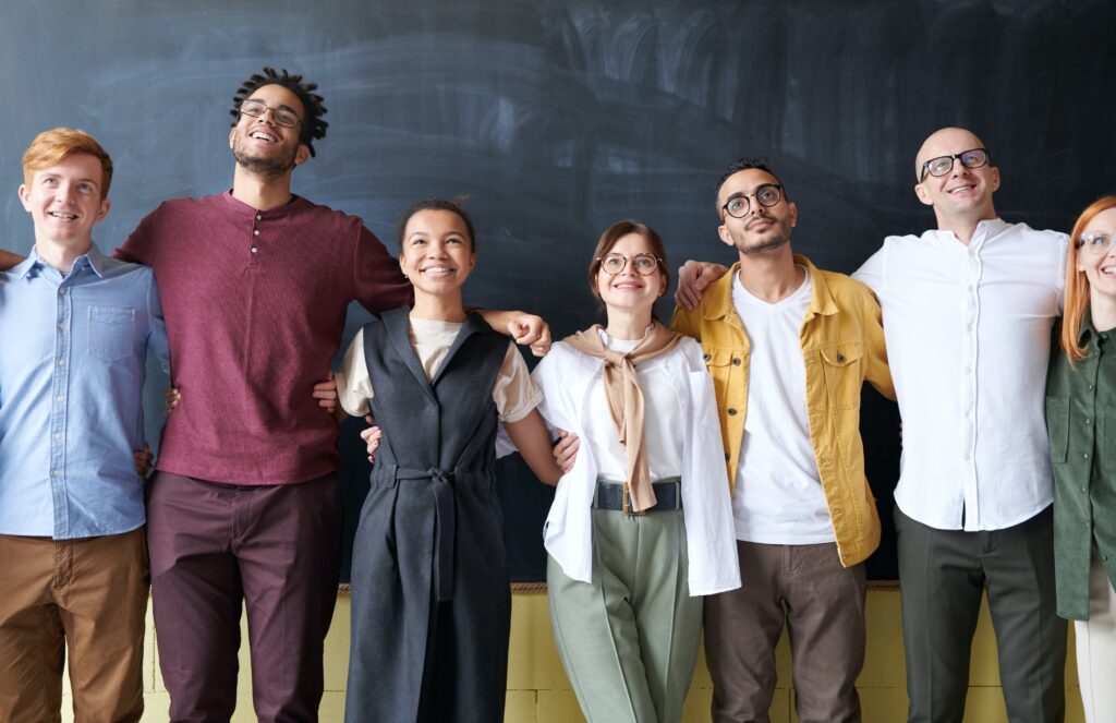 Smiling adult learners in a classroom